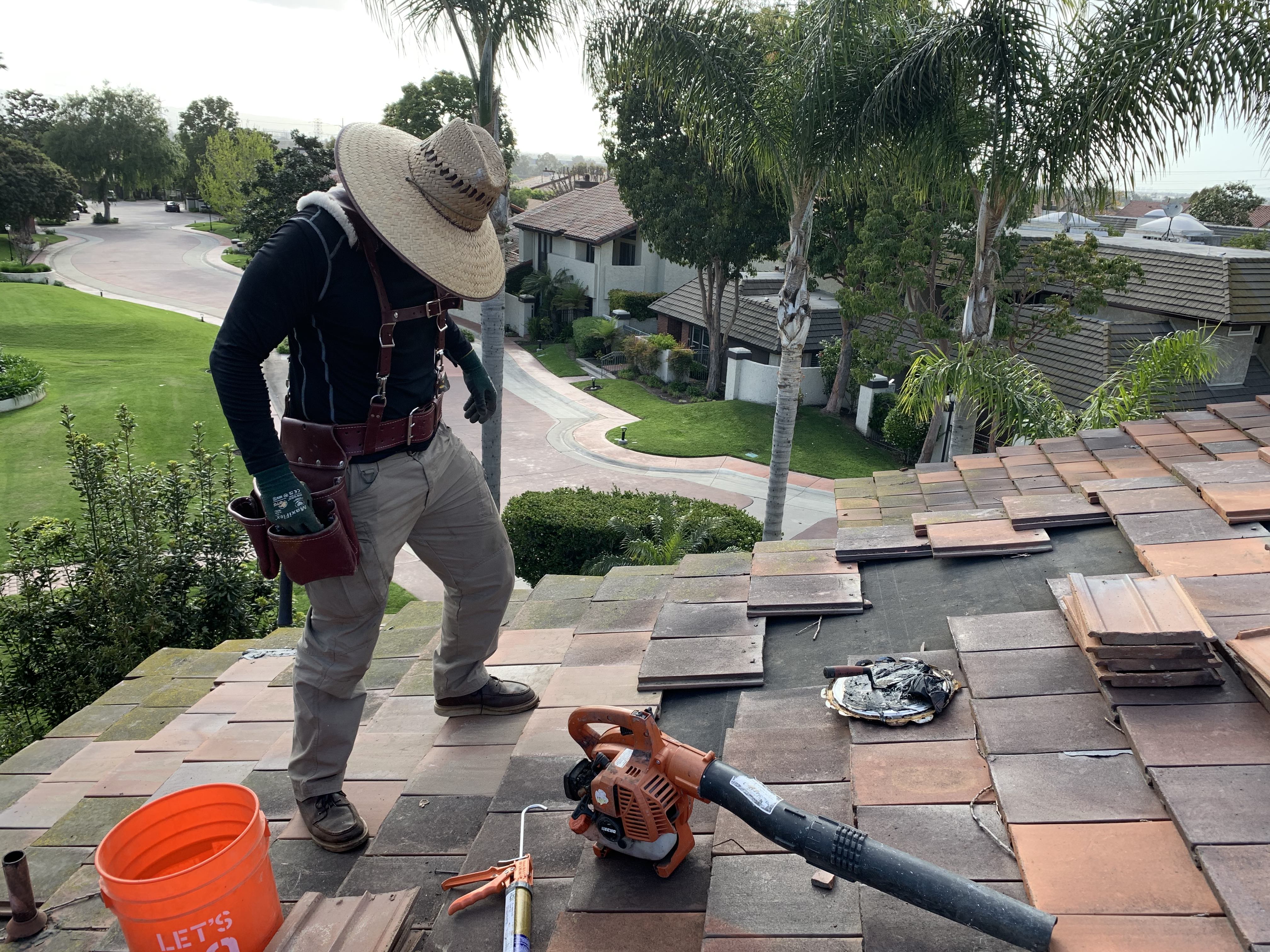 Professional roofing work in progress